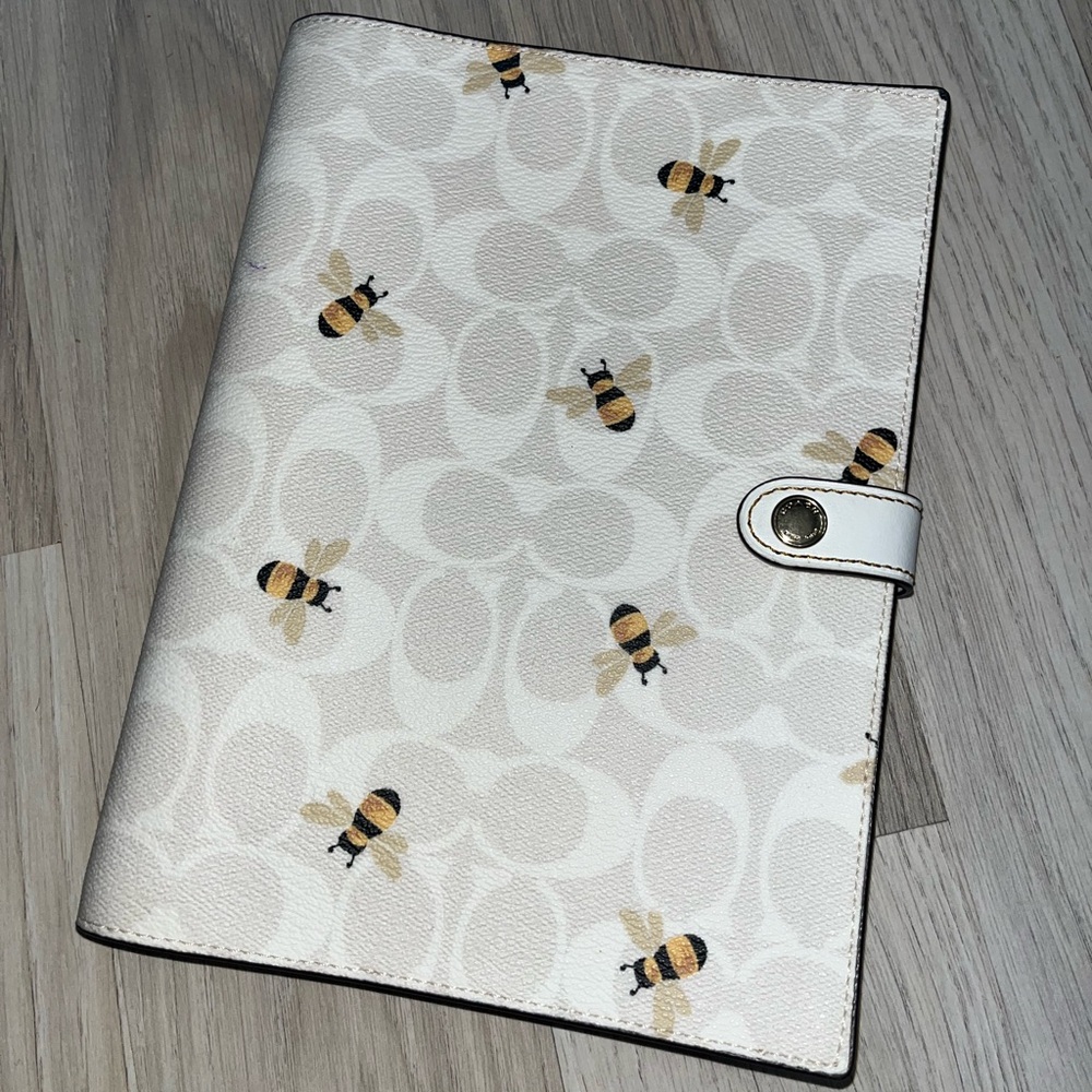 Coach notebook in signature canvas with Bee print